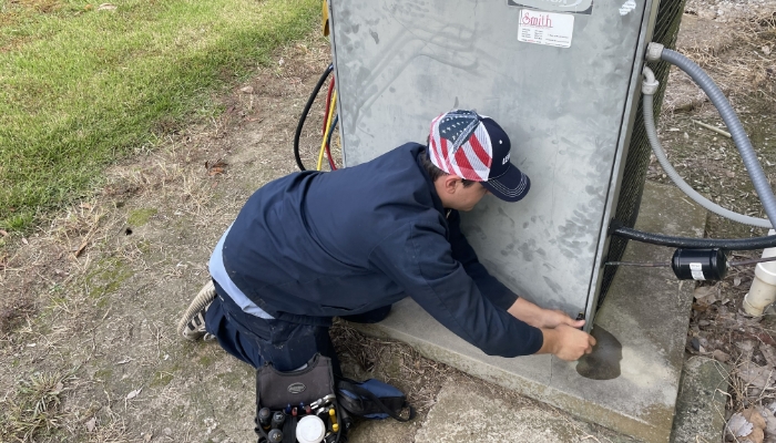 Hvac Condesnsor Getting Worked On