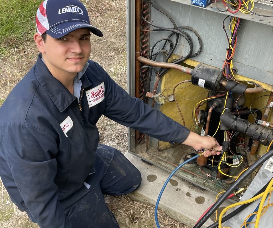 Technician Working On Hvac Unit